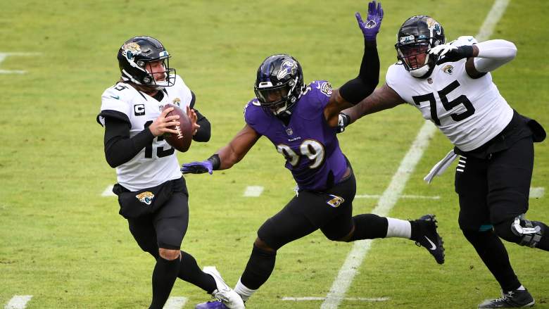 Ravens LB Matthew Judon chases down Jaguars QB Gardner Minshew.