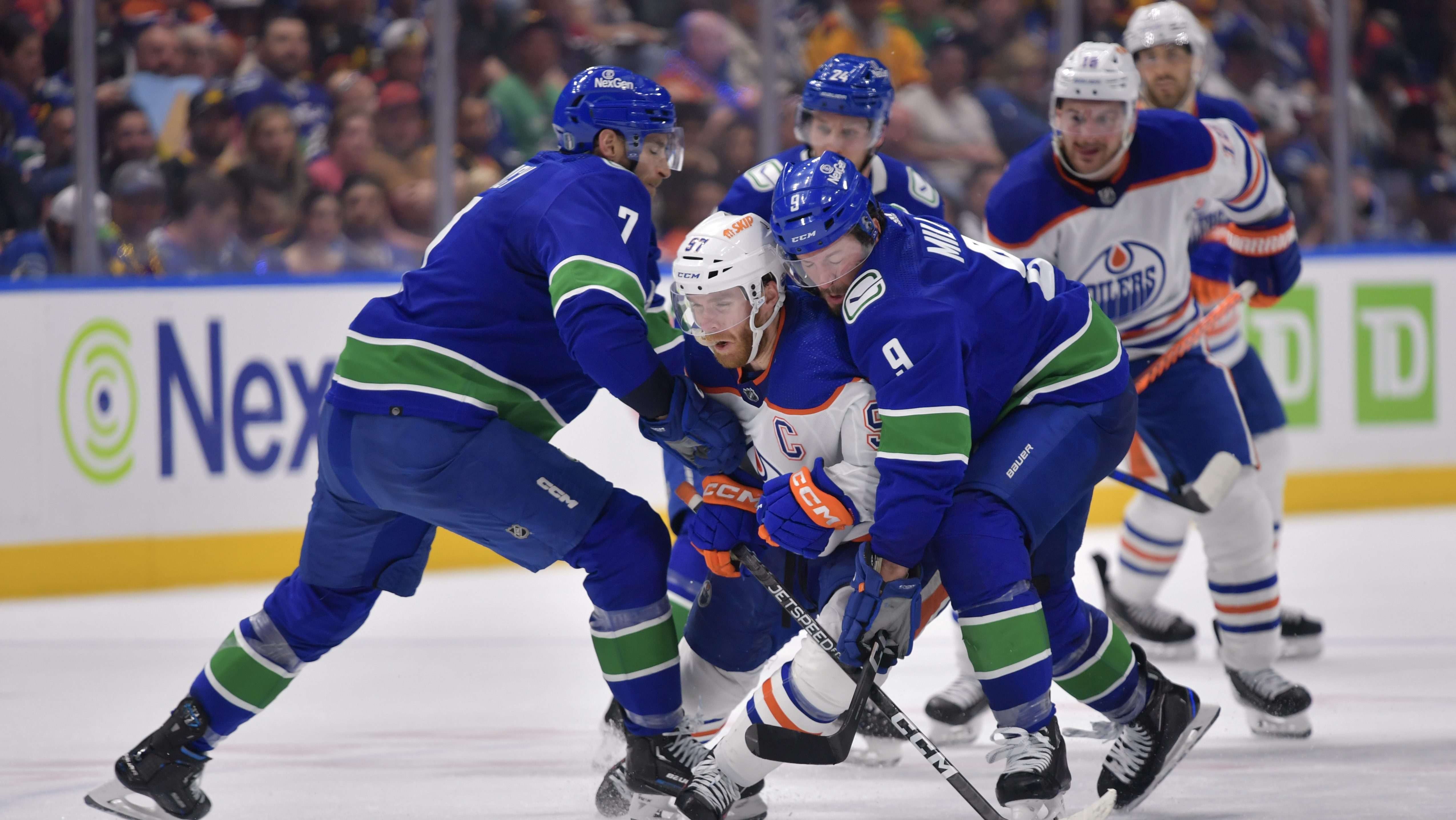 Canucks Team-Up, Brutally Cross-Check Connor McDavid’s Throat