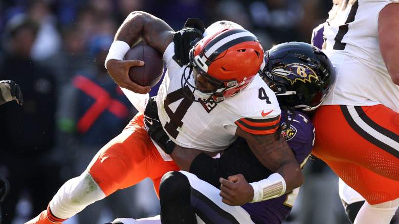 Deshaun Watson of the Cleveland Browns is tackled by Jadeveon Clowney.
