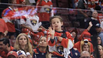 Shirtless Fan Pops Up During Rangers’ Coach Interview