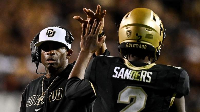 Cowboys longshot coach candidate Deion Sanders (left) and his son/quarterback Shedeur Sanders.