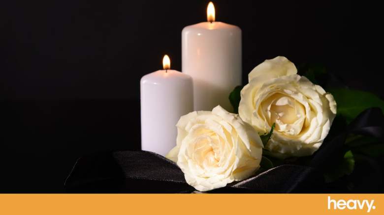 Flowers and candles are pictures in a story about Shannen Doherty's death.
