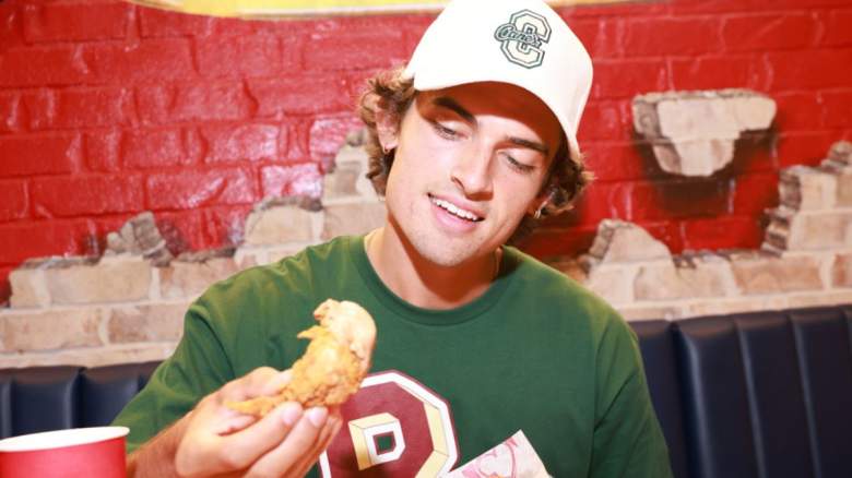 Sam Hurley enjoys a meal at Raising Cane's.