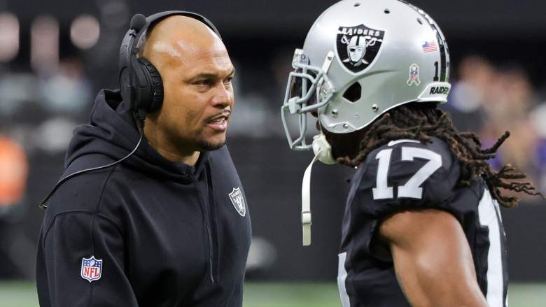 Raiders coach Antonio Pierce (left) and Davante Adams