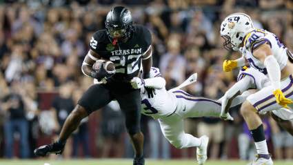 E.J. Smith’s Family: Dad Emmitt Smith ‘Proud’ of Aggie Son