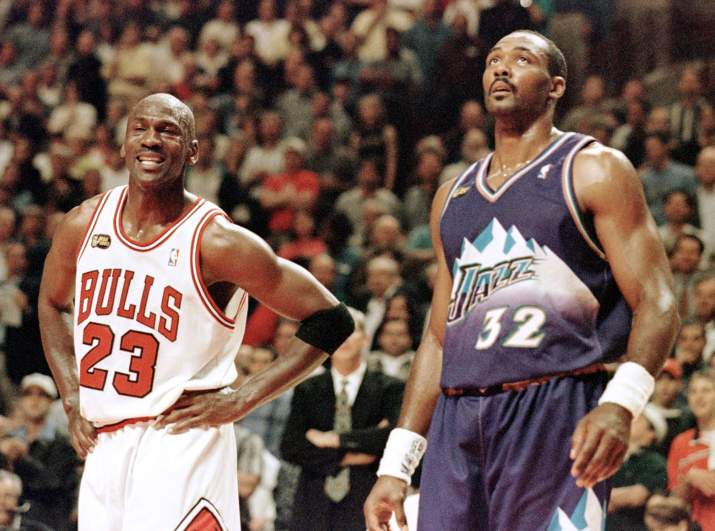 Michael Jordan, left, and Karl Malone, right