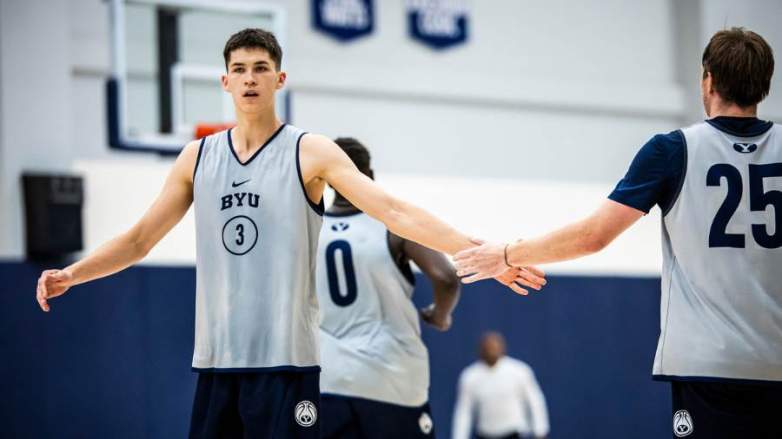 BYU freshman Egor Demin celebrates with teamate at practice.