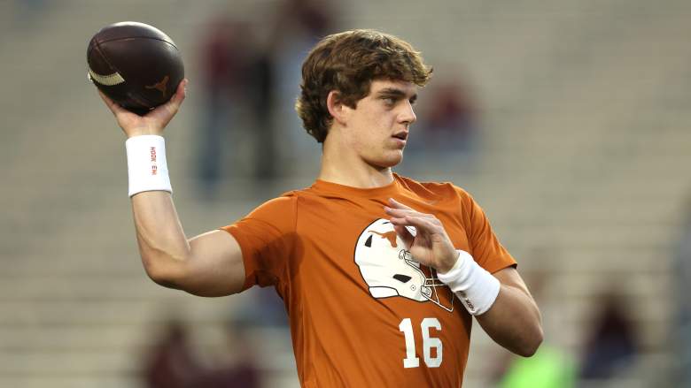 Arch Manning of the Texas Longhorns warms up prior to a game against the Texas A&M.