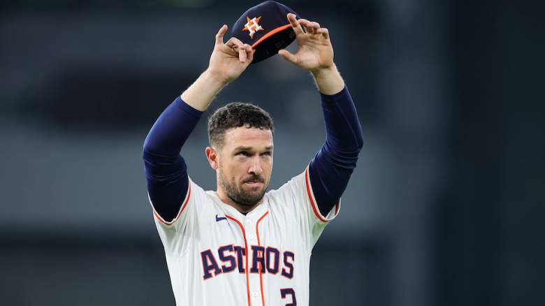 Alex Bregman gestures to fans