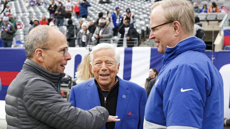 Giants owner John Mara with Patriots owners Robert and Jonathan Kraft.