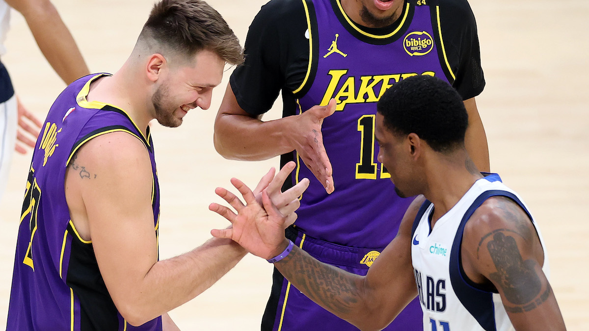 Luka Doncic (l) and Kyrie Irving (r).