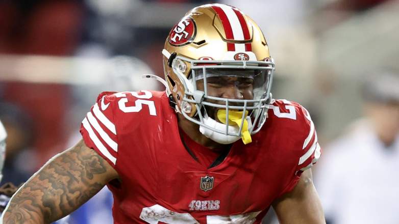 San Francisco 49ers running back Elijah Mitchell, Jaylon Moore, Kansas City Chiefs