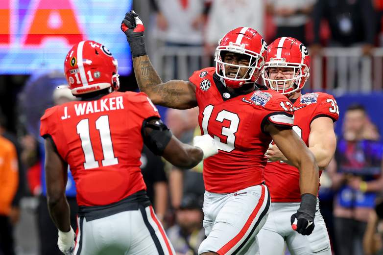 Mykel Williams (#13) and Jalon Walker (#11) of the Georgia Bulldogs.