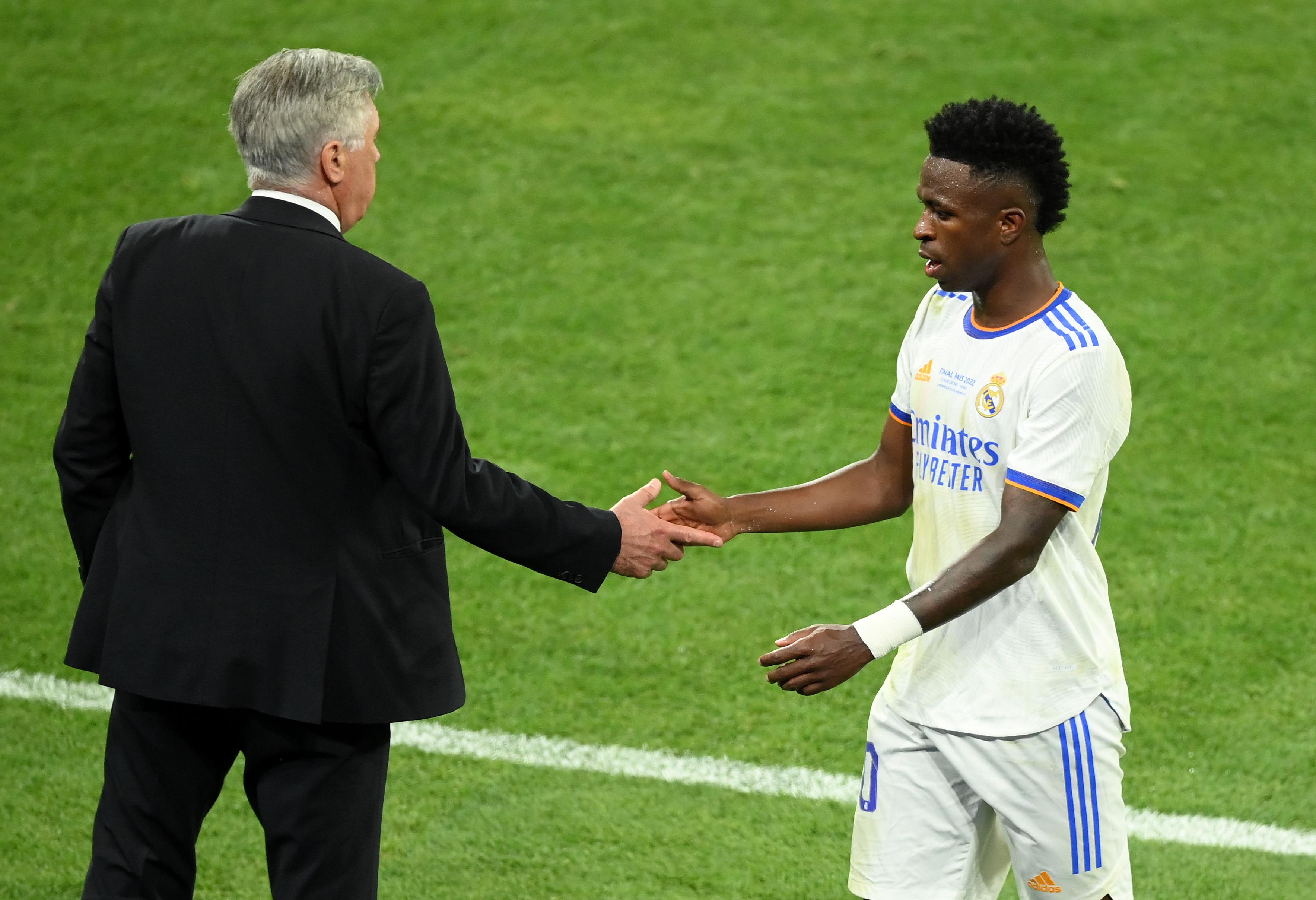 Carlo Ancelotti and Vinicius Jr.