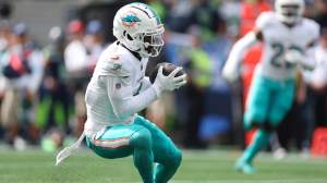 Kader Kohou of the Miami Dolphins intercepts a pass