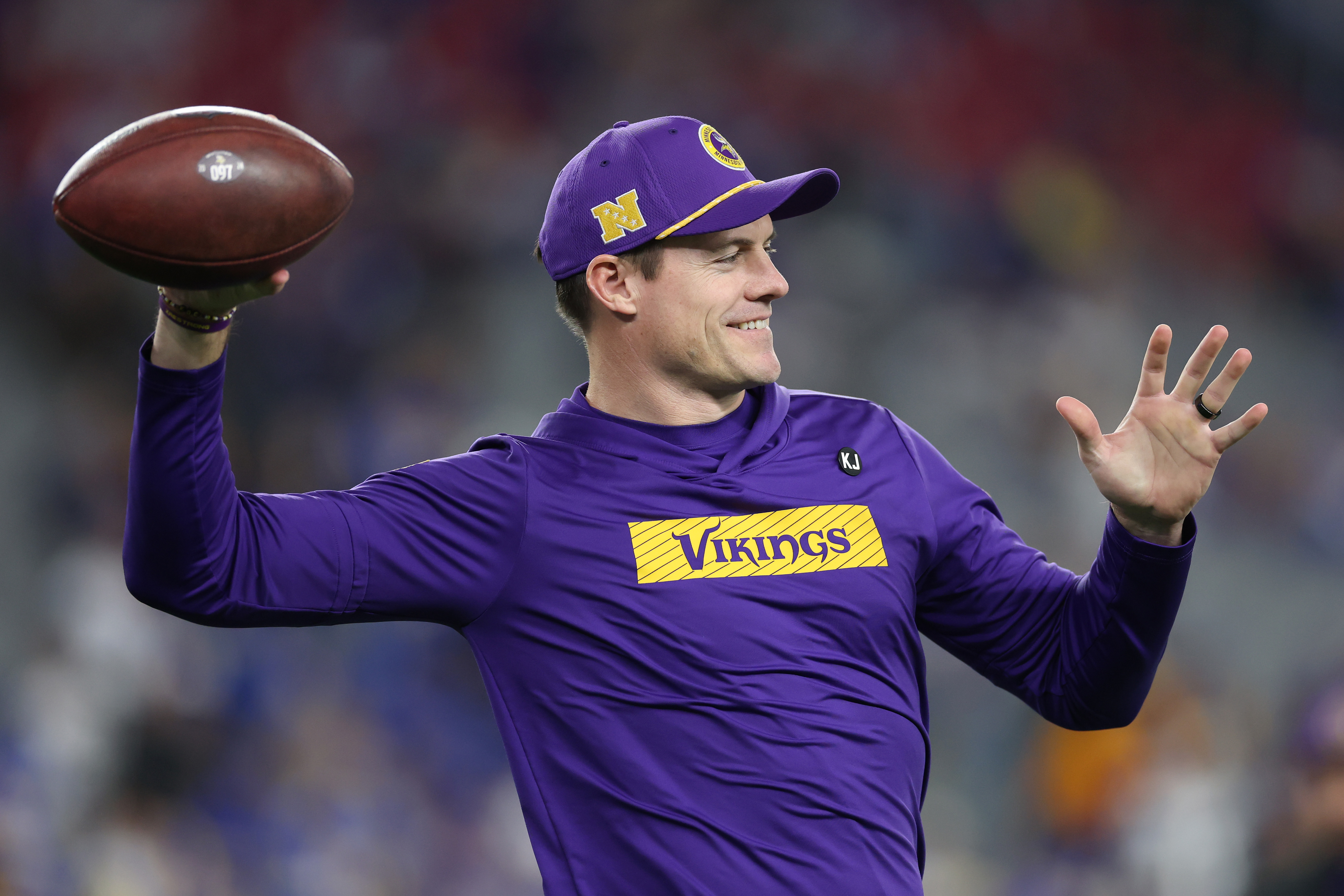 Head coach Kevin O&rsquo;Connell of the Minnesota Vikings throws the ball prior to the NFC Wild Card Playoff game against the Los Angeles Rams at State Farm Stadium on January 13, 2025 in Glendale, Arizona.  (Photo by Christian Petersen/Getty Images)