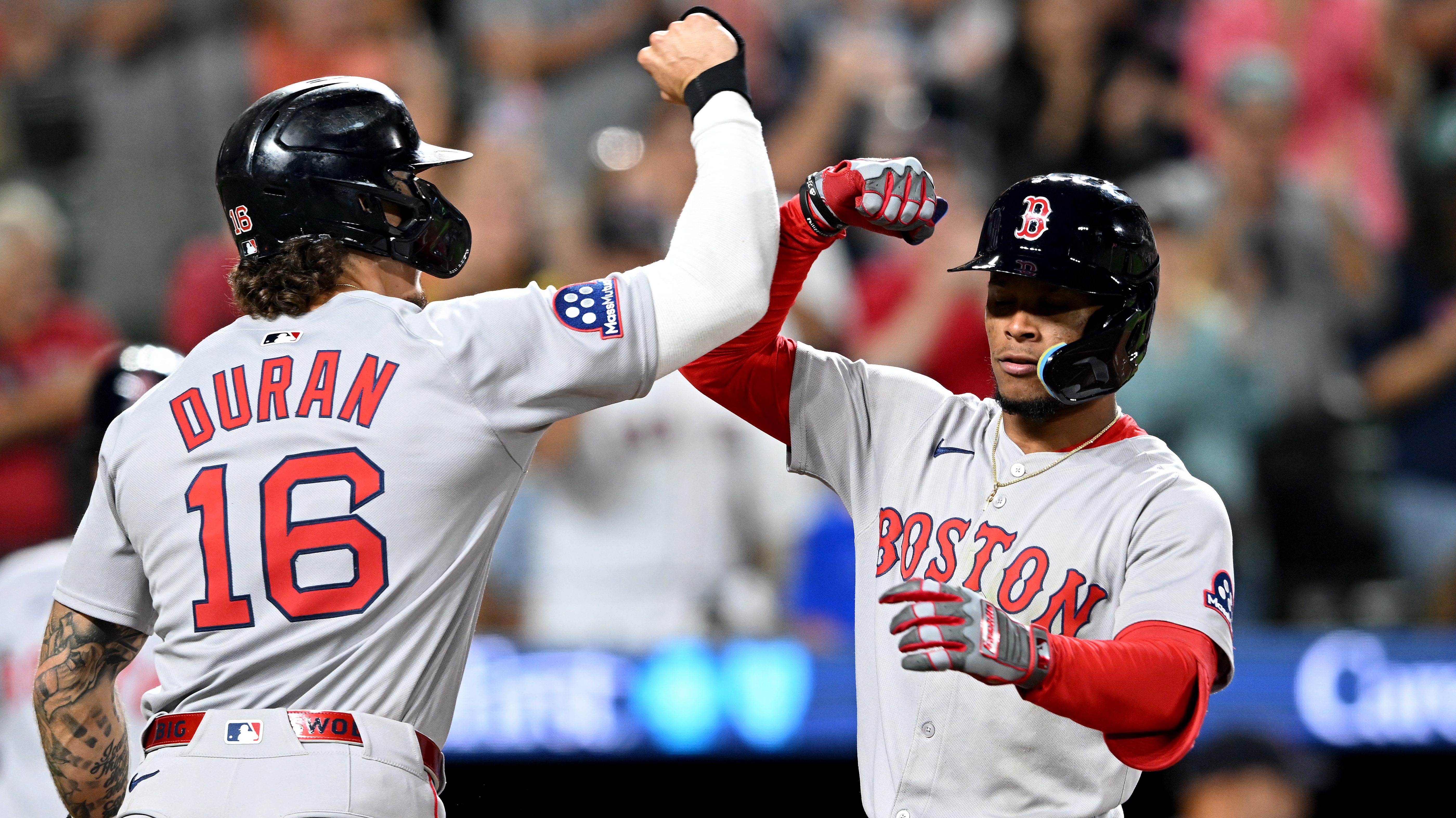 BALTIMORE, MARYLAND - AUGUST 27: Ceddanne Rafaela #3 of the Boston Red Sox celebrates with Jarren Duran #16 after hitting a two-run home run in the ninth inning against the Baltimore Orioles at Oriole Park at Camden Yards on August 27, 2025 in Baltimore, Maryland. (Photo by Greg Fiume/Getty Images)