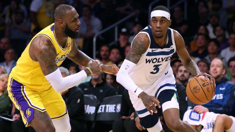 Los Angeles Lakers forward LeBron James guards Minnesota Timberwolves forward Jaden McDaniels
