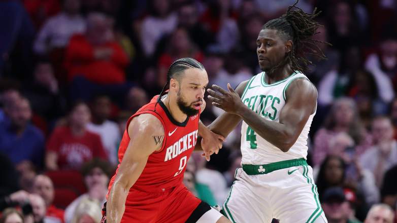 Boston Celtics point guard Jrue Holiday defends Houston Rockets forward Dillon Brooks