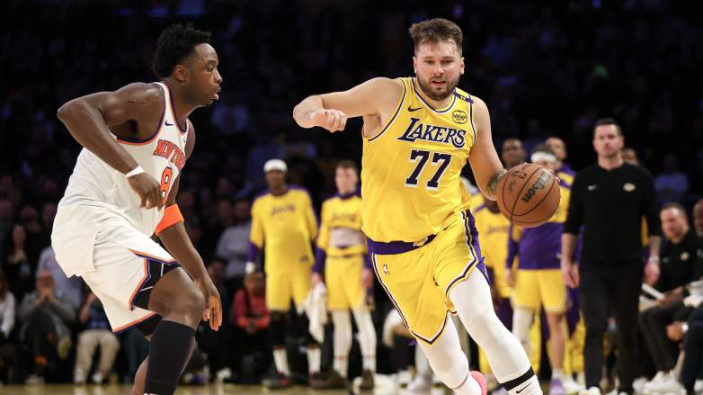 Los Angeles Lakers guard Luka Doncic dribbles past New York Knicks forward OG Anunoby