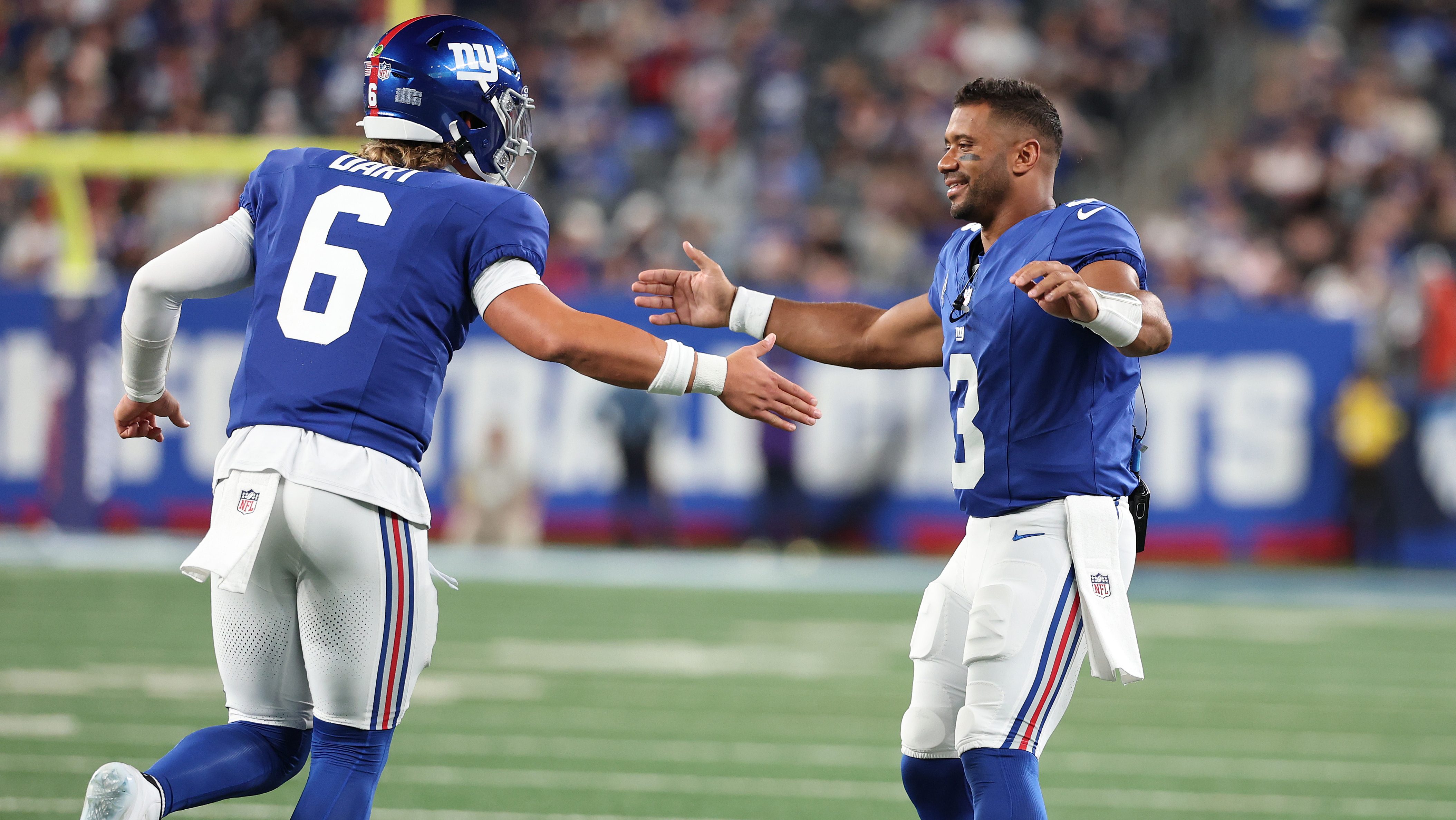 Jaxson Dart and Russell Wilson