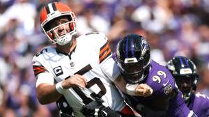 BALTIMORE, MARYLAND - SEPTEMBER 14: Joe Flacco #15 of the Cleveland Browns is rushed by Odafe Oweh #99 of the Baltimore Ravens during the game at M&T Bank Stadium on September 14, 2025 in Baltimore, Maryland. (Photo by Ishika Samant/Getty Images)