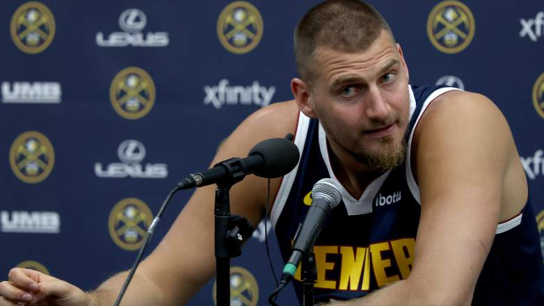 Nikola Jokic reacts to a question during a press conference.