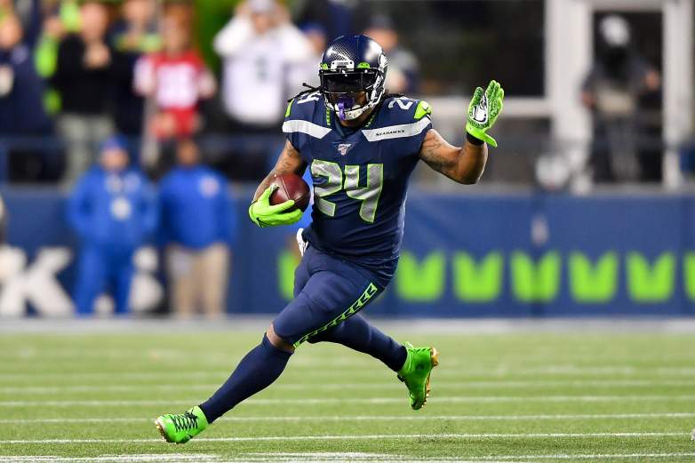 Marshawn Lynch runs during an NFL game.