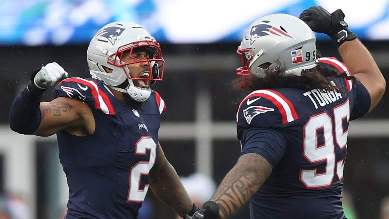 FOXBOROUGH, MASSACHUSETTS - SEPTEMBER 07: Harold Landry III #2 and Khyiris Tonga #95 of the New England Patriots celebrate after a sack during the game against the Las Vegas Raiders at Gillette Stadium on September 07, 2025 in Foxborough, Massachusetts. (Photo by Adam Glanzman/Getty Images)