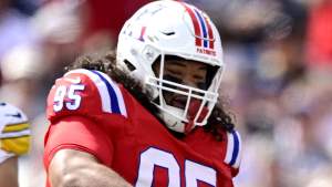 FOXBOROUGH, MASSACHUSETTS - SEPTEMBER 21: Khyiris Tonga #95 celebrates with Joshua Farmer #92 of the New England Patriots during the first half against the Pittsburgh Steelers at Gillette Stadium on September 21, 2025 in Foxborough, Massachusetts. (Photo by Jaiden Tripi/Getty Images)