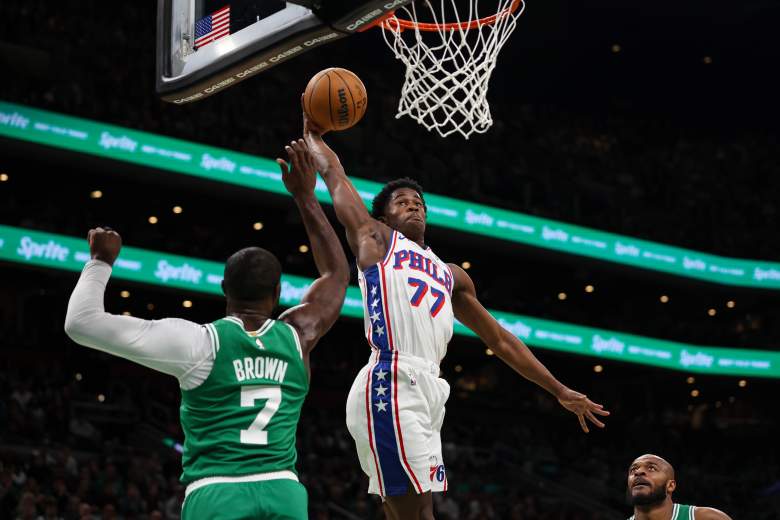 VJ Edgecombe dunks a against the Boston Celtics in an NBA game. 