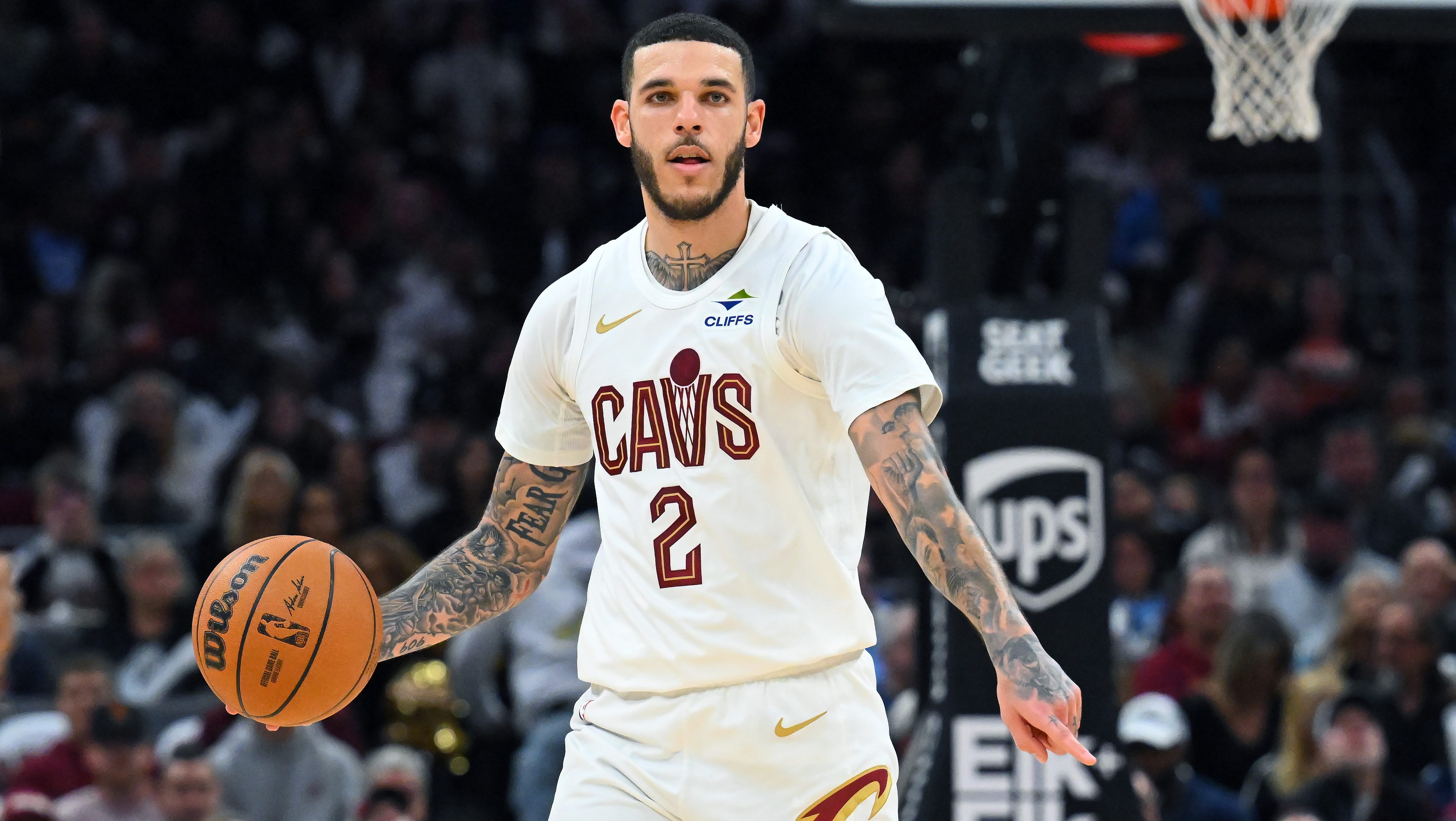 Lonzo Ball makes a move in an NBA game.