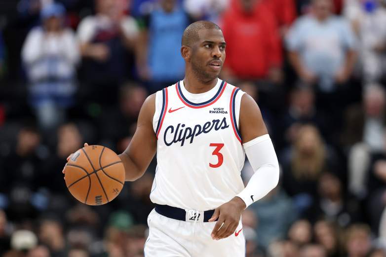 Chris Paul brings the ball up the court during an NBA game.