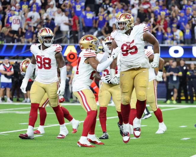 The San Francisco 49ers celebrate in an NFL game.