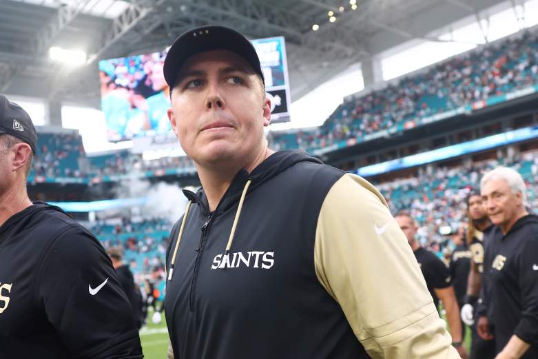Kellen Moore looks on during an NFL game.