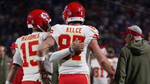 Patrick Mahomes #15 and Travis Kelce #87 of the Kansas City Chiefs walk off the field together during the second quarter in the game against the Buffalo Bills at Highmark Stadium on November 02, 2025 in Orchard Park, New York