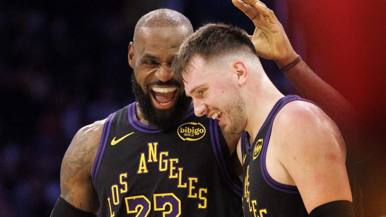 Lakers LeBron James reacts with Luka Doncic (77)