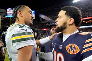 Jordan Love embraces Caleb Williams