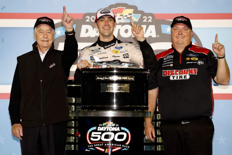 Austin Cindric celebrates after winning the 2022 Daytona 500 at Daytona International Speedway.