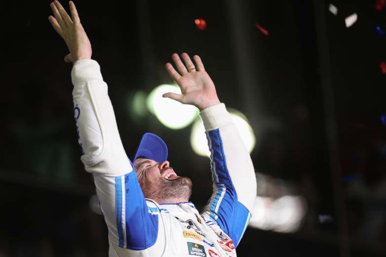 Ricky Stenhouse Jr. celebrates after winning the 2023 Daytona 500 at Daytona International Speedway.
