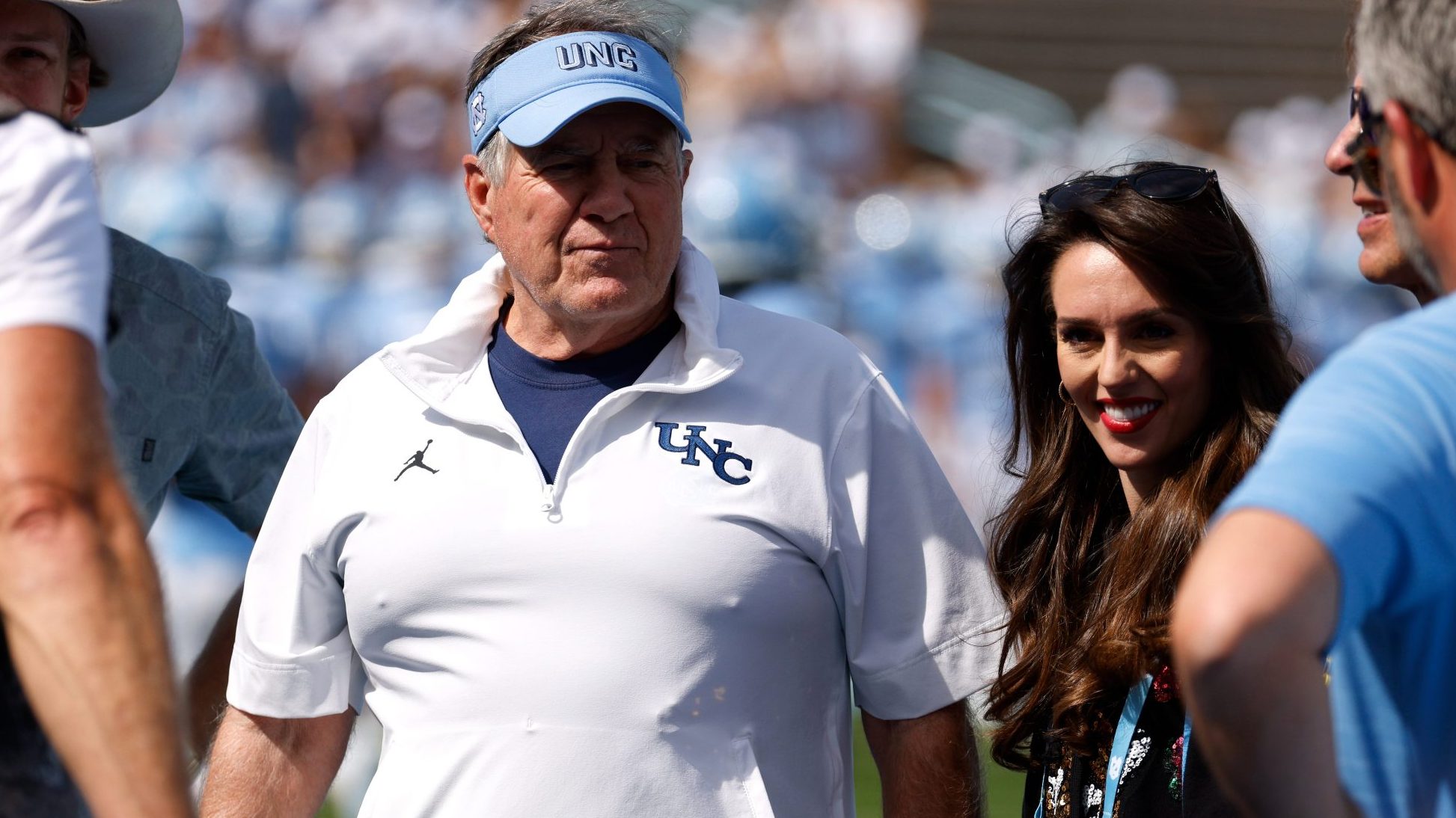 Belichick’s girlfriend apparently trolls Kraft with spa shirt.