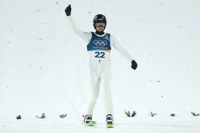 Contenders in the ski jumping event are measured by 3D scanners for their suits ahead of competition