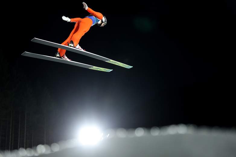 Athletes in ski jumping try to land farther than their competitors