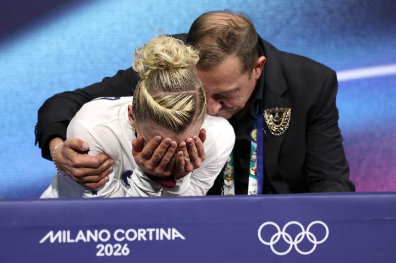 Team USA's Amber Glenn cries after receiving a penalty during the women's short program figure skating event at the Winter Olympics