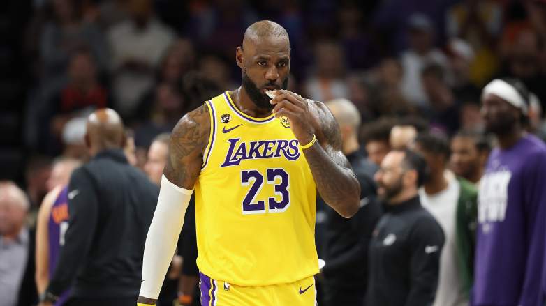Lakers LeBron James rating Luka Reaves lineup, Los Angeles Lakers LeBron defensive rating, JJ Redick hot seat, Deandre Ayton struggles, Deandre Ayton benched, Deandre Ayton Clint Capela, Lakers net rating LeBron Luka Reaves, Lakers three-game losing streak, Lakers Suns game, Lakers lose, Lakers clutch record, Lakers LeBron Luka Reaves lineup stats