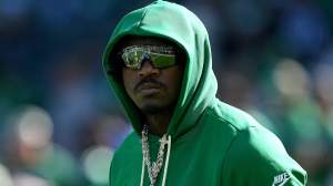 A.J. Brown looks on from the sidelines during an Eagles game.