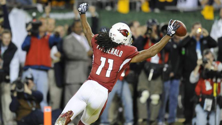 Arizona Cardinals receiver Larry Fitzgerald scores a touchdown in Super Bowl XLIII against the Pittsburgh Steelers.
