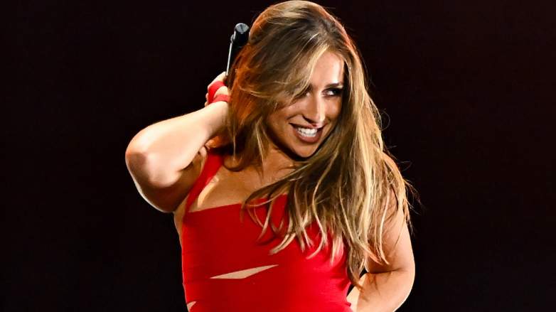 Pop star Tate McRae performs amid Jack Hughes dating rumors.