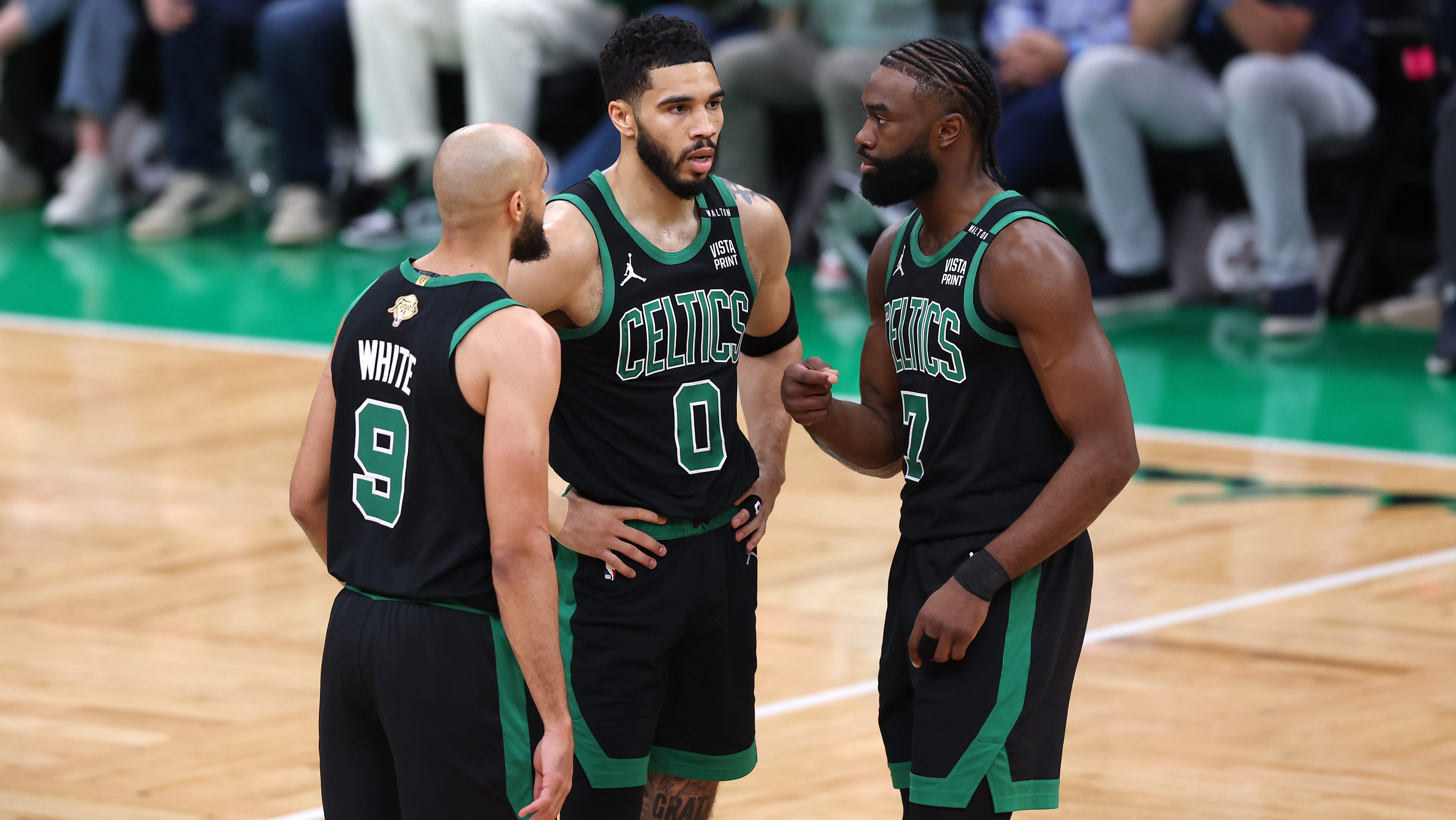 Derrick White, Jayson Tatum, and Jaylen Brown
