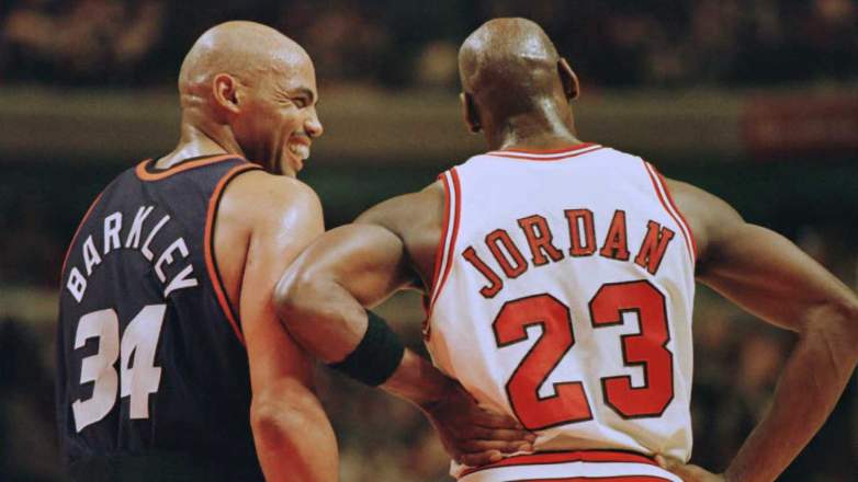 Charles Barkley and Michael Jordan talking during a Chicago Bulls vs Phoenix Suns game in 1996